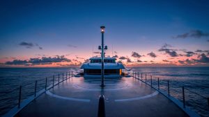 7410adc0 faca 11eb 9a95 eb2b826885d9 Inmarsat superyacht helipad sunset Adobe stock